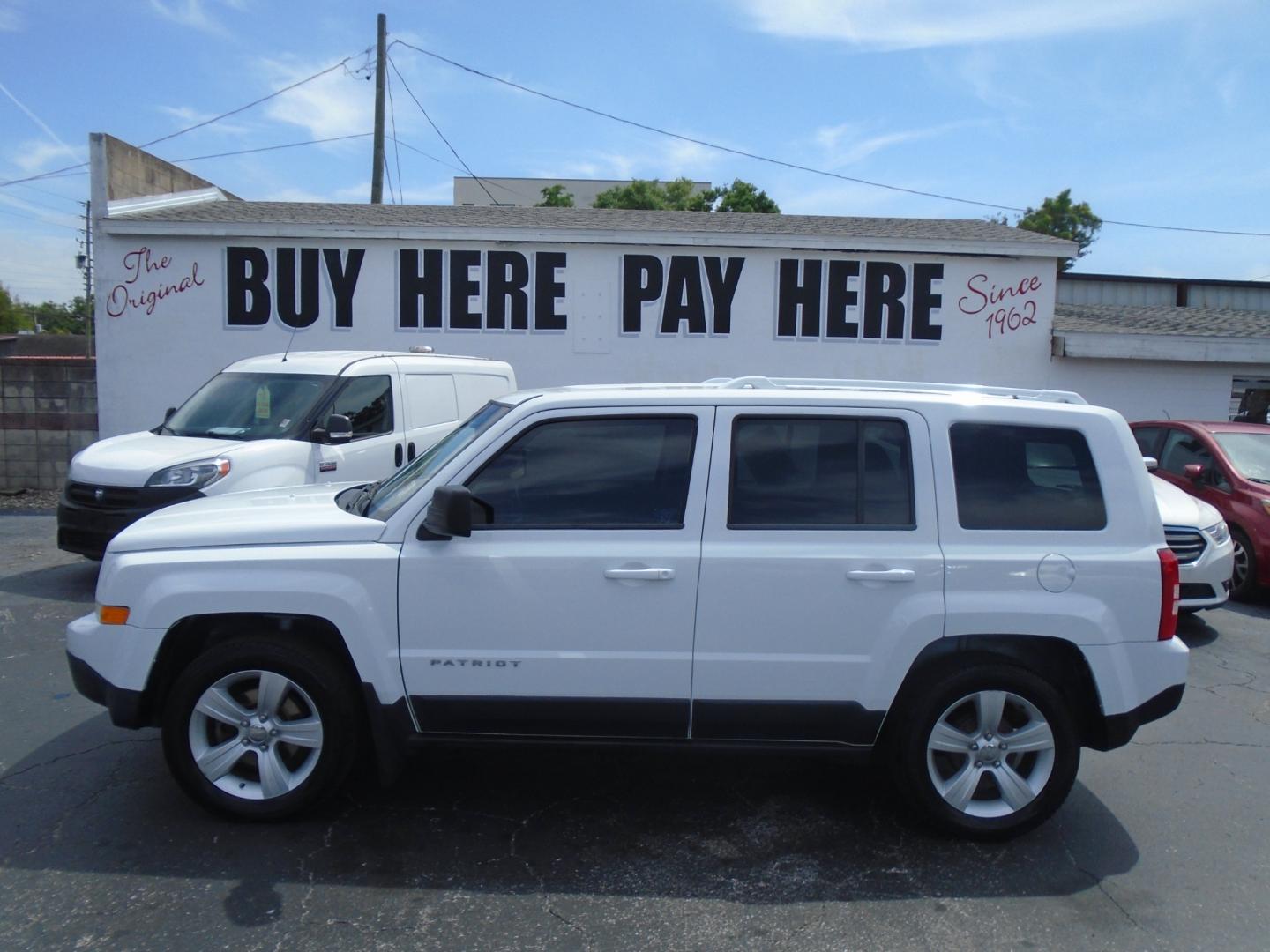 2014 Jeep Patriot Latitude 2WD (1C4NJPFA5ED) with an 2.0L L4 DOHC 16V engine, located at 6112 N Florida Avenue, Tampa, FL, 33604, (888) 521-5131, 27.954929, -82.459534 - Photo#0